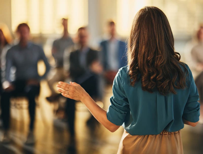 A person leading a seminar.