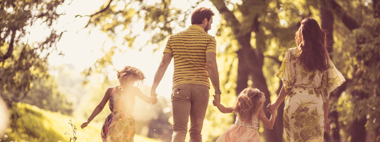 A family walking in nature.