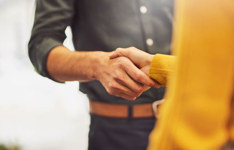 A woman working on her tablet.