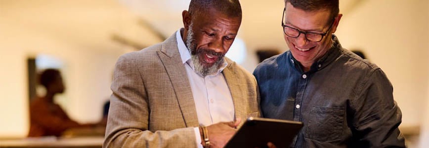 Two men reviewing a plan.